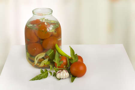 preservation of ripe tomatoes in glass closeupの写真素材