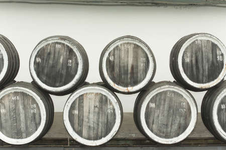old wine barrels at the winery closeup