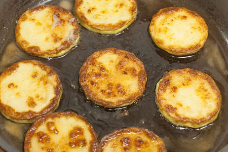 roasted squash in a frying pan closeupの写真素材