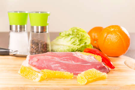 duck breast fillet on a cutting boardの写真素材