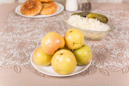 pickled apples on the plate closeupの写真素材
