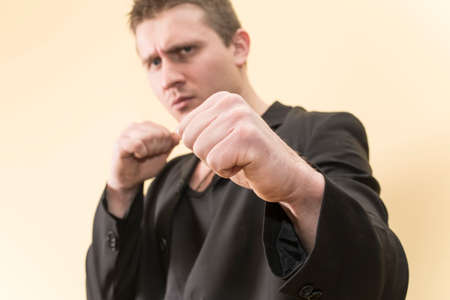 young man dressed in a Boxing stanceの写真素材