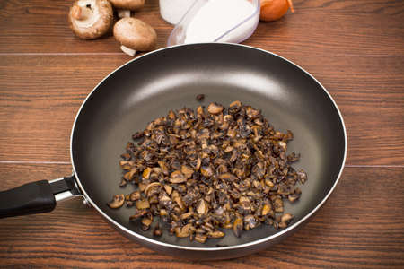 fried mushrooms on a Teflon pan without fatの写真素材