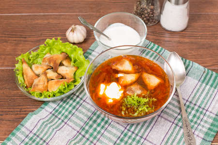 borsch with ears made of dough stuffed with buckwheatの写真素材