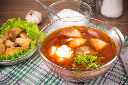 borsch with ears made of dough stuffed with buckwheatの写真素材