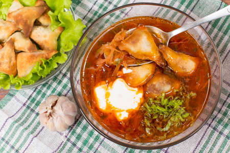 borsch with ears made of dough stuffed with buckwheatの写真素材