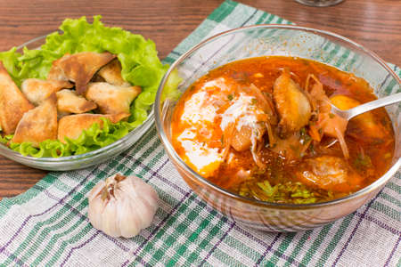 borsch with ears made of dough stuffed with buckwheatの写真素材