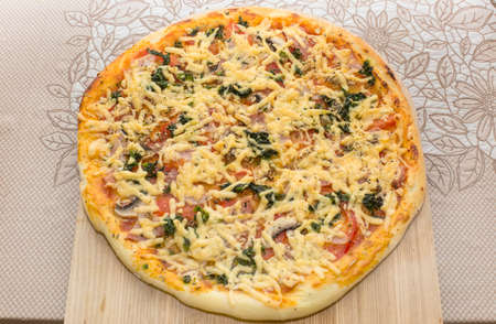 pizza with ham and cheeseの写真素材
