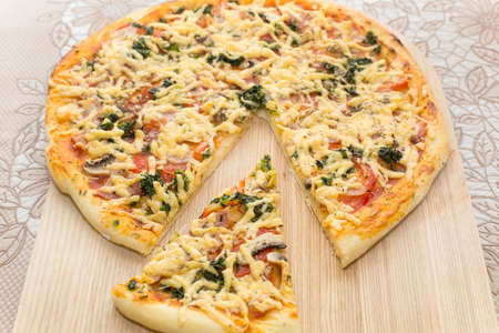 pizza with ham and cheeseの写真素材