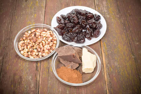 set of products for the manufacture of candy plum in chocolateの写真素材