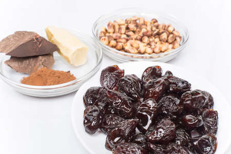 set of products for the manufacture of candy plum in chocolateの写真素材