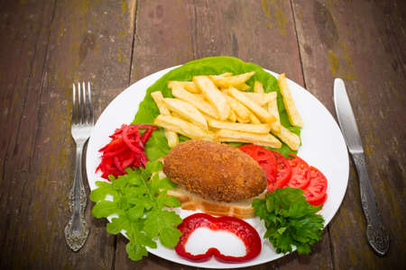 chicken fish Ukraine on the croutons with grilled friesの写真素材