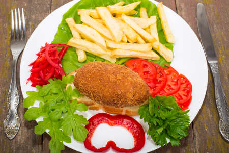 chicken fish Ukraine on the croutons with grilled friesの写真素材