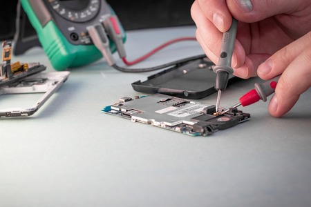 repair smartphone multimeterの写真素材