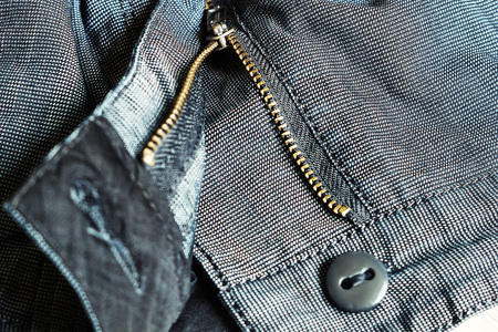 the imege open zipper pant, button, macroの写真素材