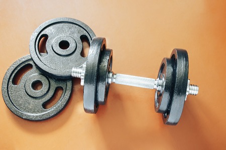 The image dumbbell lying on the floor of the training hallの写真素材