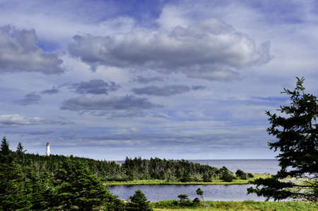 Lighthouse at Louisbourg, Canada and the atlantic oceanの写真素材
