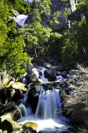 Several waterfalls cascading over the rocksの写真素材
