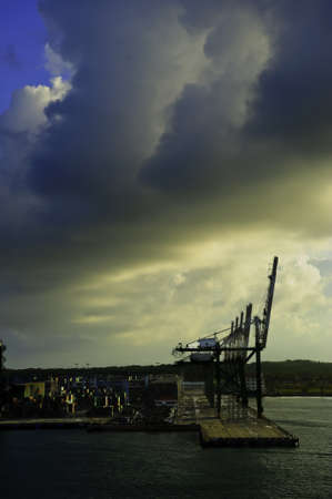 Cranes and shipping containers at the Port of Colon Panama at sunriseの写真素材
