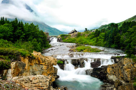 Cascades on swiftcurrent creek in Glacier National Parkの写真素材