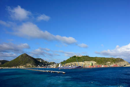Cargo ship docked at Sint Maarten Island.の写真素材