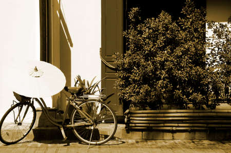 Bicycle parking outside of buildingの写真素材