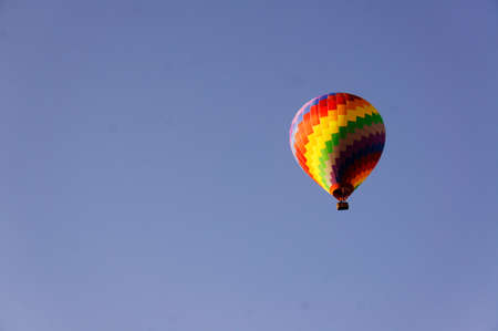 Hot air balloon in the airの写真素材