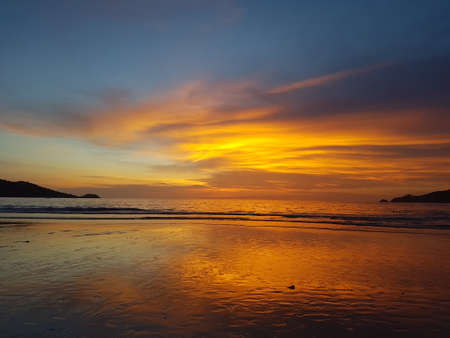Amazing sunset Patong beach, Phuket, Thailandの写真素材