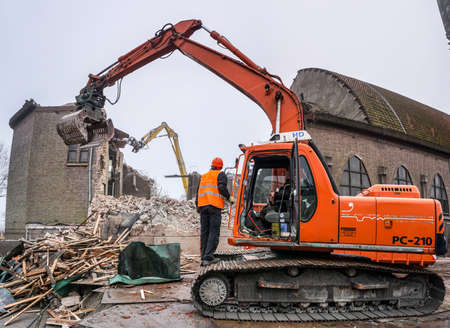 Demolition of Church with Hydraulic machinesのeditorial素材