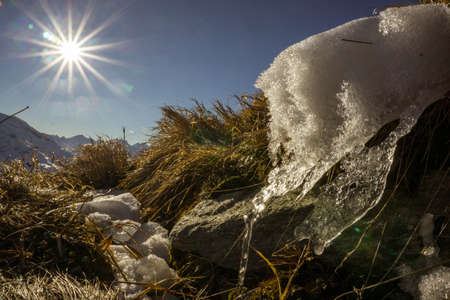 Melting ice in the sunの写真素材