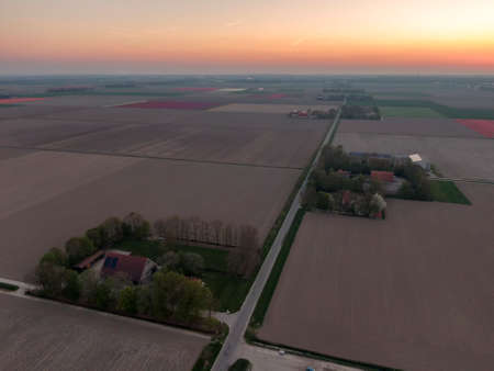 aerial of farms with agriculture plotsの写真素材