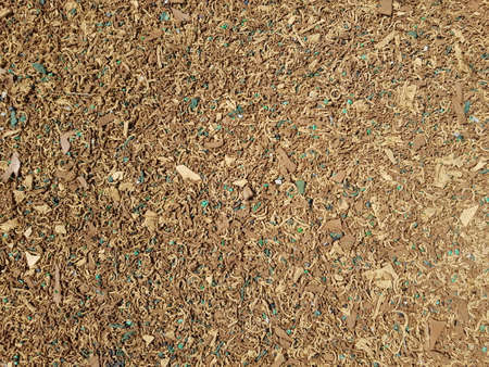 Texture of rubber surface with wooden look used for soft falling in playgroundsの写真素材