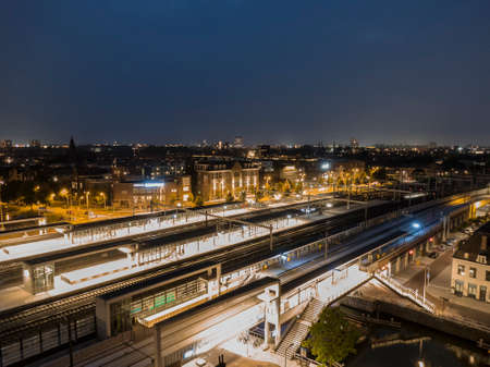 Railway station Utrecht Vaartsche Rijn seen at nightの写真素材