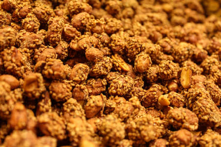 Peanuts breaded in sesame seeds.の写真素材