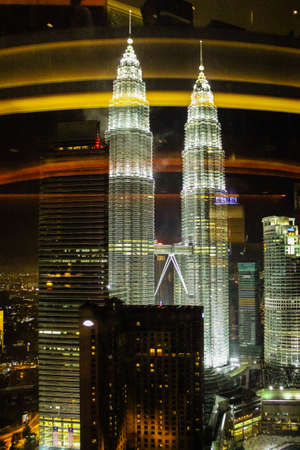 Kuala Lumpur Malaysia September 8 2013. Petronas twin towers night view from an other skyscraper.のeditorial素材