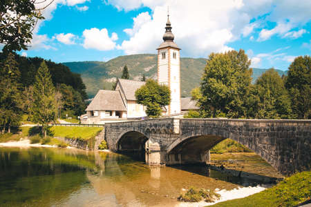 Bohinj Slovenia September 9 2014. Bohinj Lake and Church St. John The Baptist.のeditorial素材