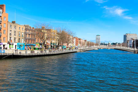 Dublin Ireland April 1 2014. River Liffey view at high tide and and its quay.