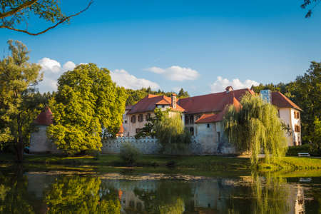 Otocec, Slovenia - 12 september 2015. Grad Otocec, castle in the middle of the river Krka.のeditorial素材