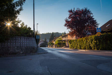 Empty small street in the rays of the evening sun.の写真素材