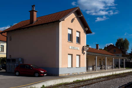 Domzale, Slovenia - September 9, 2015. Typical train station for a small slovenian town or village.のeditorial素材