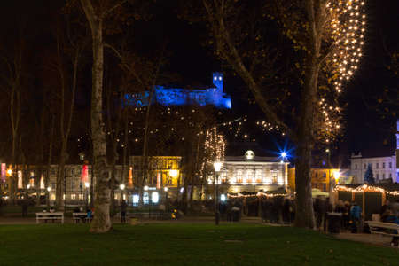 Ljubljana, Slovenia - November 27, 2015. Ljubljana castle, the hill and park trees in christmas lights.のeditorial素材