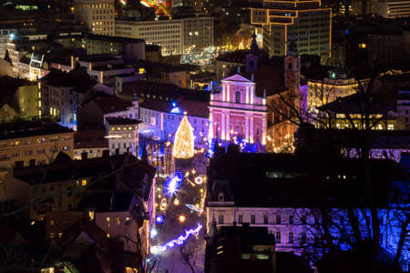 Ljubljana, Slovenia - November 27, 2015. Christmas tree and christmas lights on the central city Preseren square.のeditorial素材