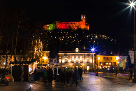 Ljubljana, Slovenia - November 27, 2015. Ljubljana castle in christmas lights from the city square.のeditorial素材