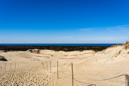 The Gray Dunes, or the Dead Dunes is sandy hills with a bit of green specks at the Lithuanian side of the Curonian Spitの写真素材