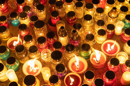 colorful candle jars glowing warmly in the night