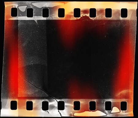 grunge film strip background with light leak の写真素材