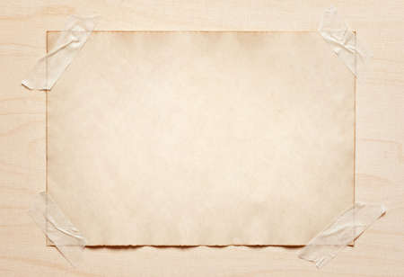 old paper sticked on wooden boardの写真素材