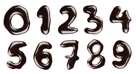 Numbers written with chocolate syrup, isolatedの写真素材