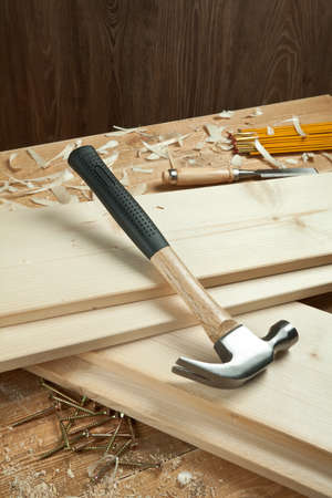 Wooden planks and hammer.