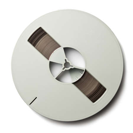 Vintage magnetic audio reel, isolated.